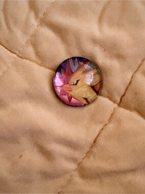 Pokemon Yellow and Pink Glass Cabochon Badge